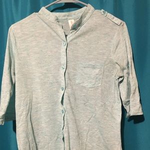 Nice button down t shirt. Size large